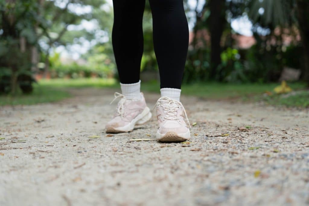 A woman goes for a walk pain-free.